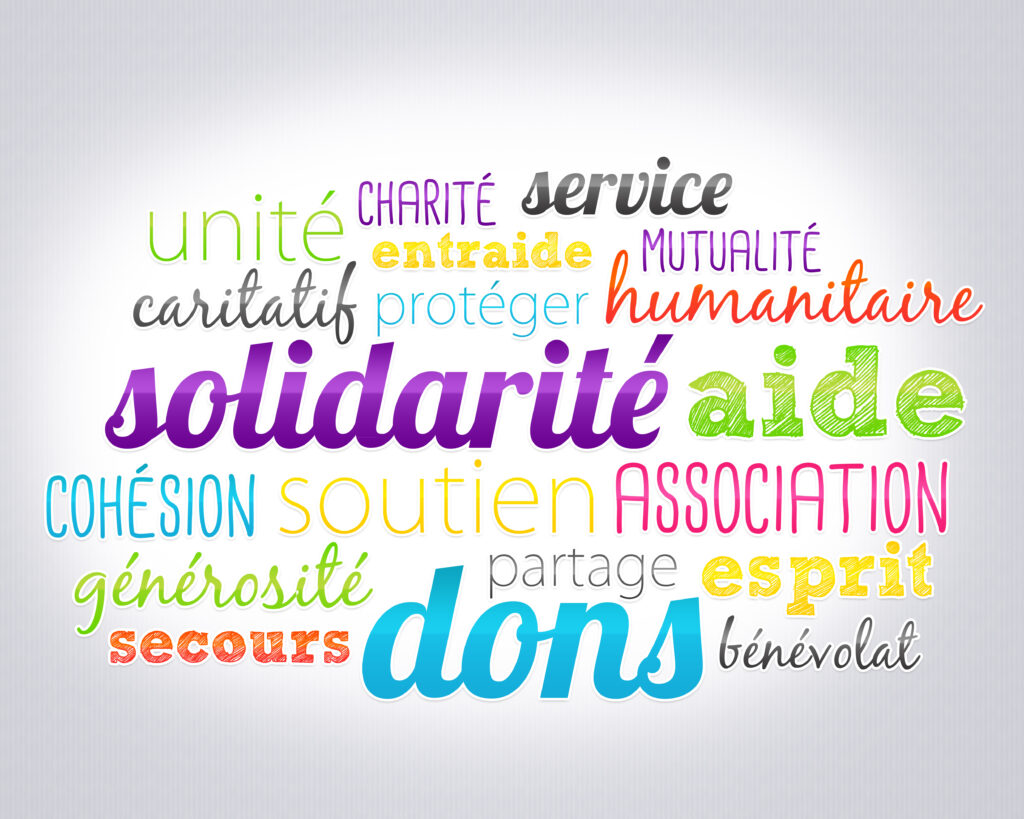Nuage de mots illustrant la solidarit&eacute; et l'aide, avec des termes vari&eacute;s exprimant soutien et assistance.